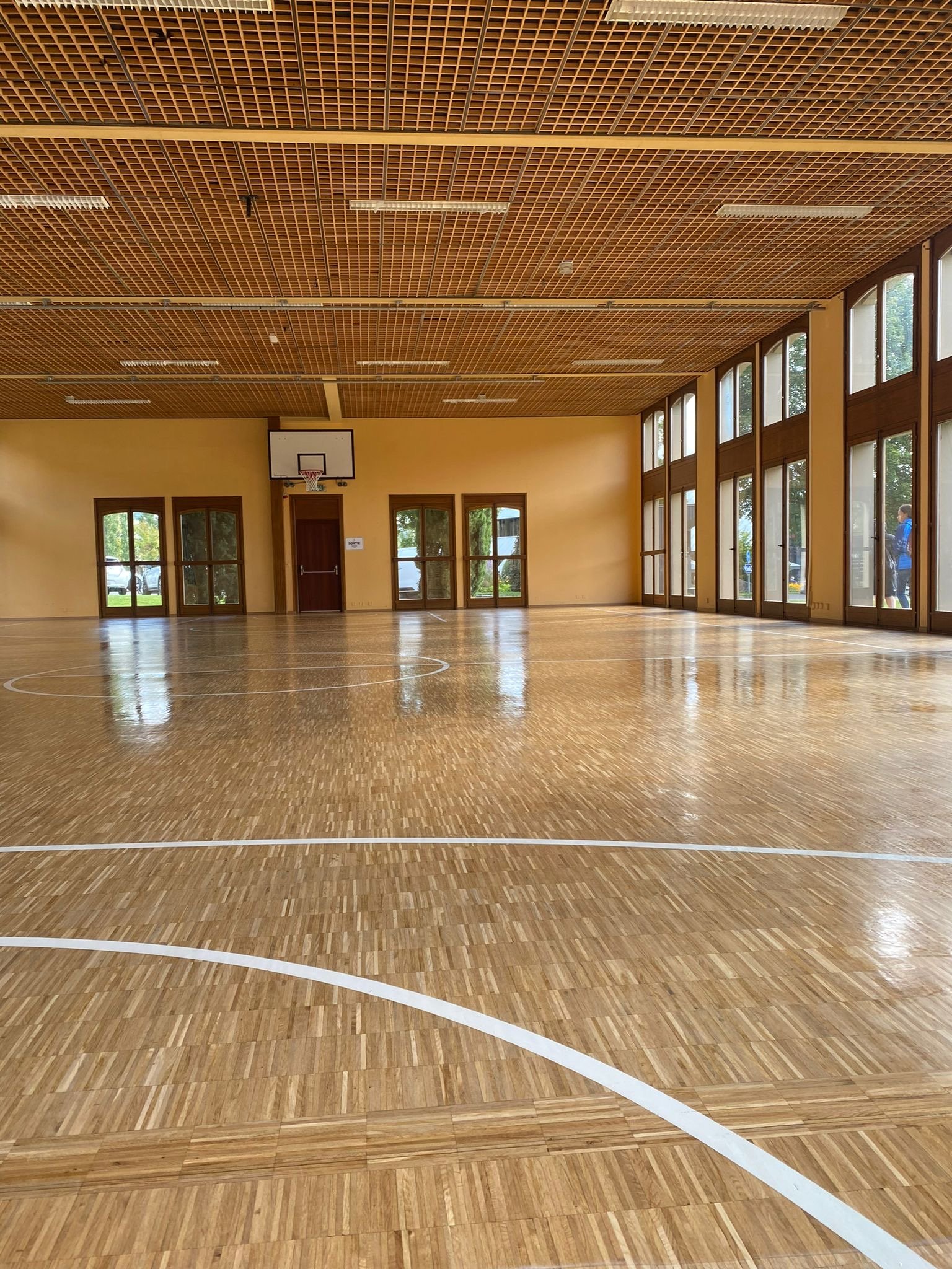 Rénovation parquet chêne avant/après - salon Genève